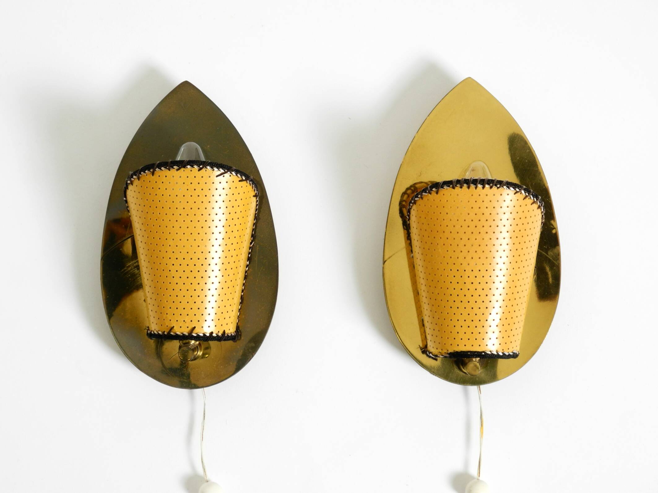 Two enchanting original Mid Century Modern brass wall lamps