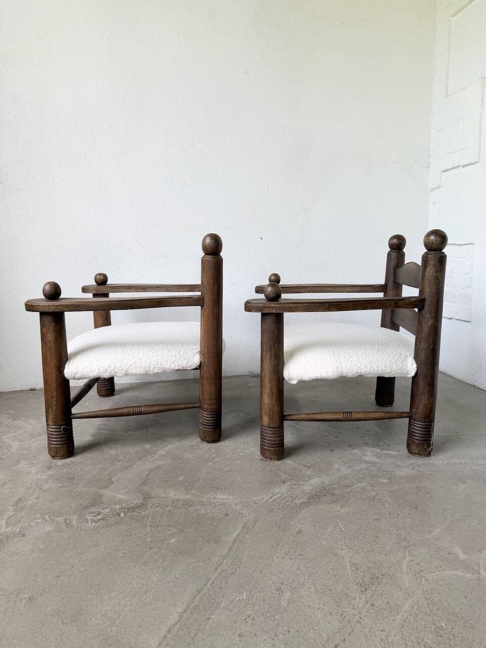 Pair of Dudouyt armchairs from the 1950s, oak.