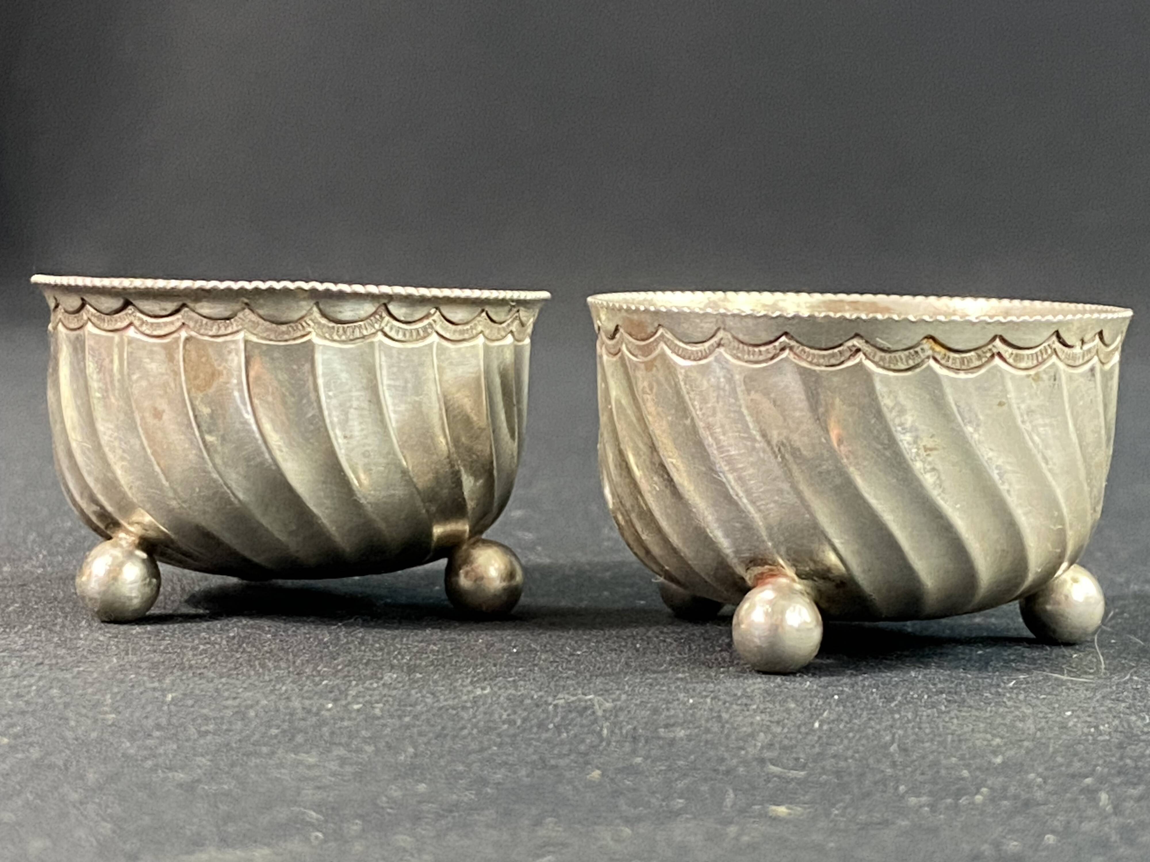 Pair of solid silver salt cellars with weevil hallmark