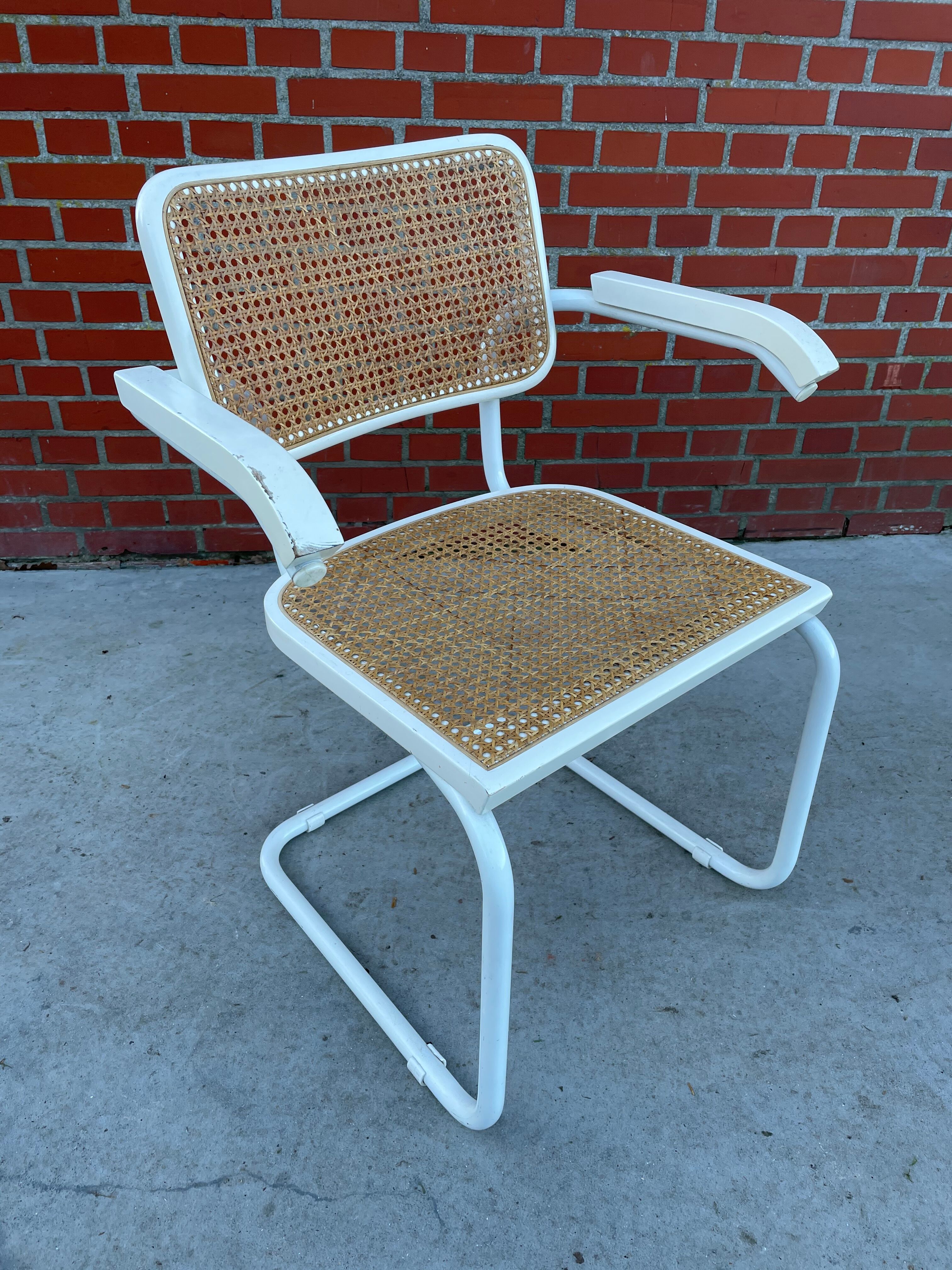 Cesca Chair model with armrest in white