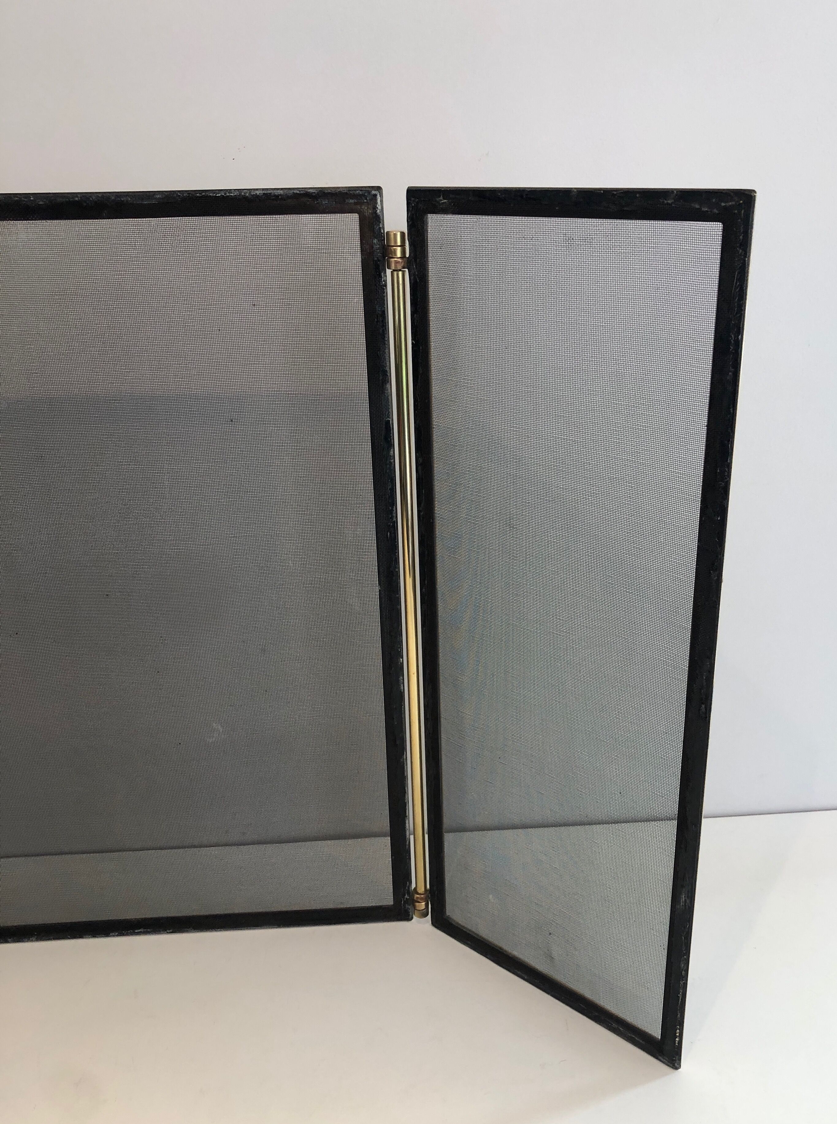 Brass and wire mesh firewall. french work. around 1970