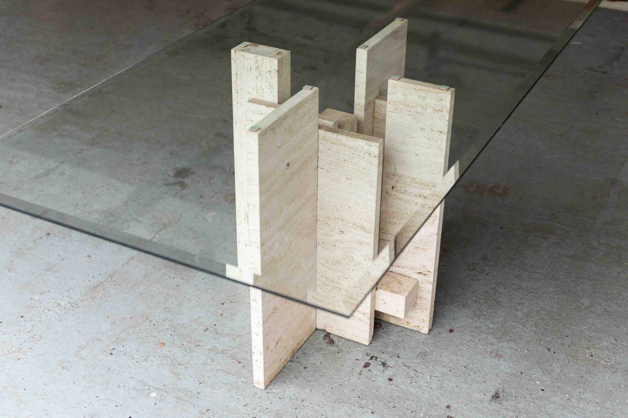 Glass & travertine dining table by Willy Ballez