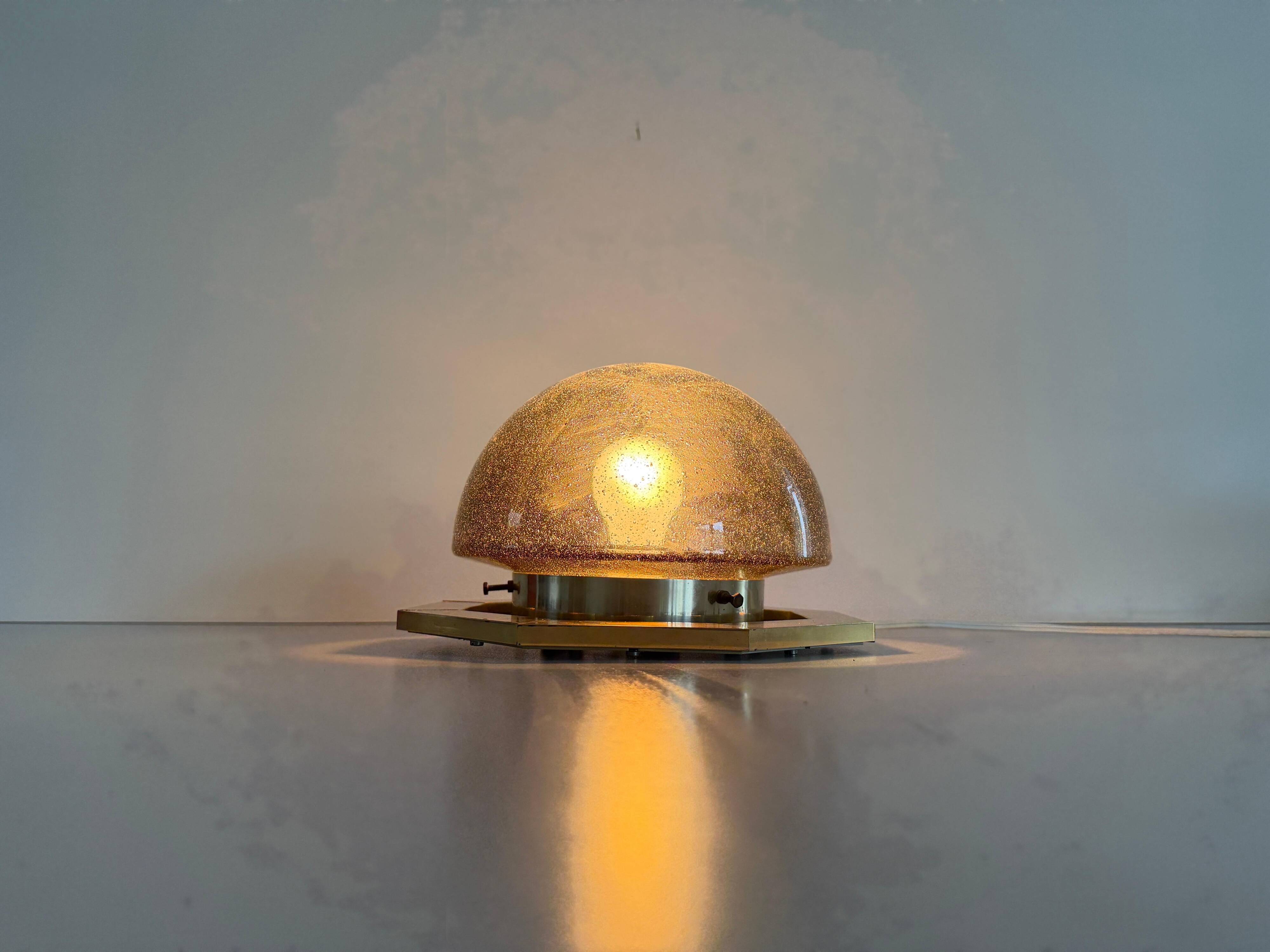 Octagonal ceiling light in brown glass and brass base by Limburg, 1960s, Germany.