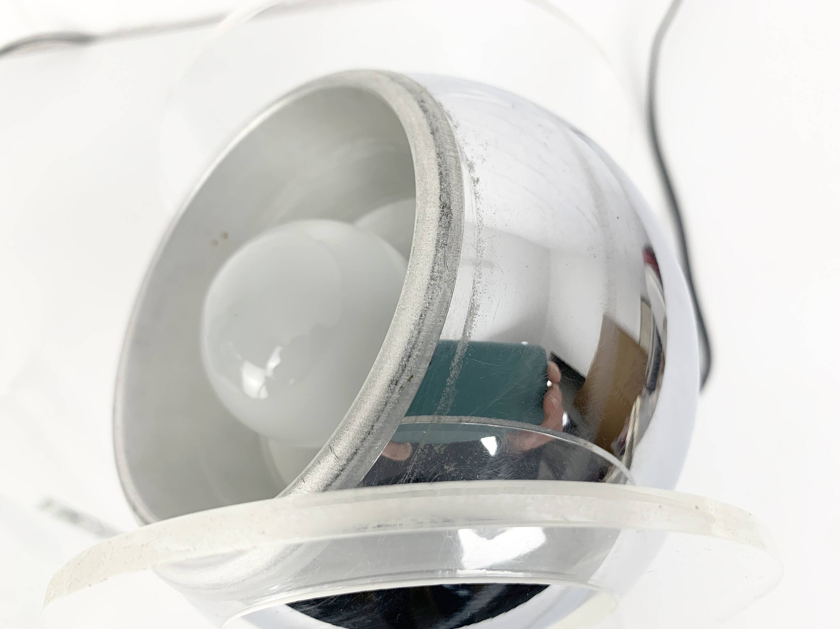 Pair of space age chrome plexiglass sphere table lamps from the 70s