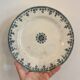 Set of 6 mismatched old iron earth flat plates