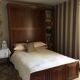 Electric retractable bed cabinet