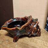 The shell-shaped trinket dish in Vallauris style.