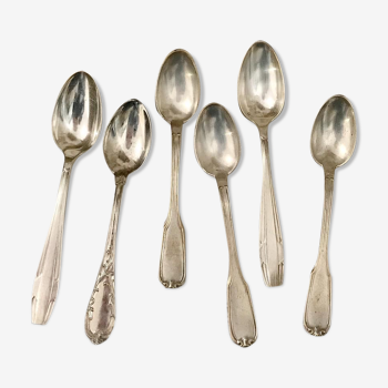 6 mismatched silver spoons