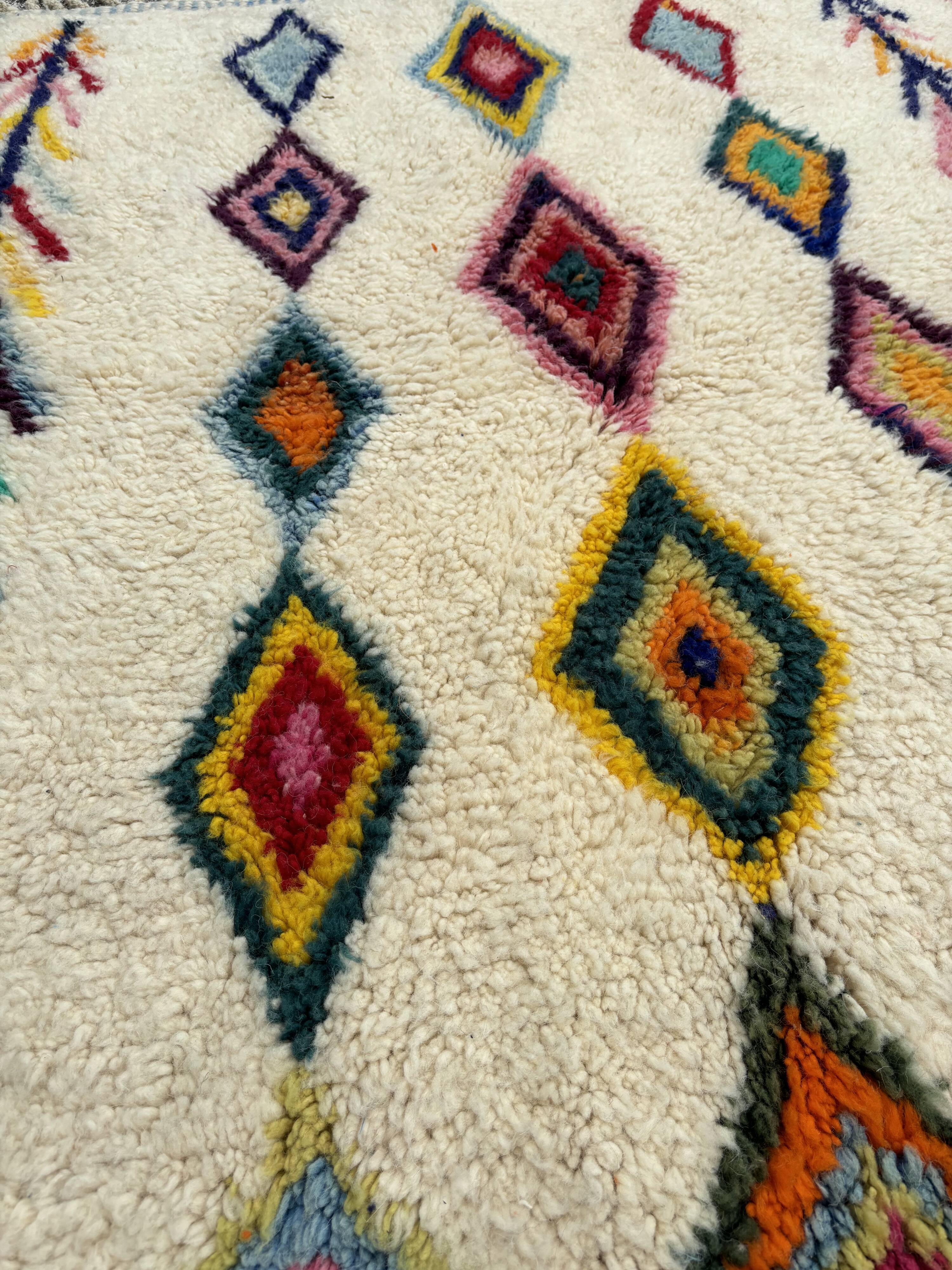 M'rirt Berber rug in cream wool with coloured patterns, 160 × 190 cm