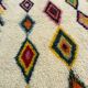 M'rirt Berber rug in cream wool with coloured patterns, 160 × 190 cm