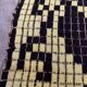 Romanian floral rug handwoven in wool, yellow and black background