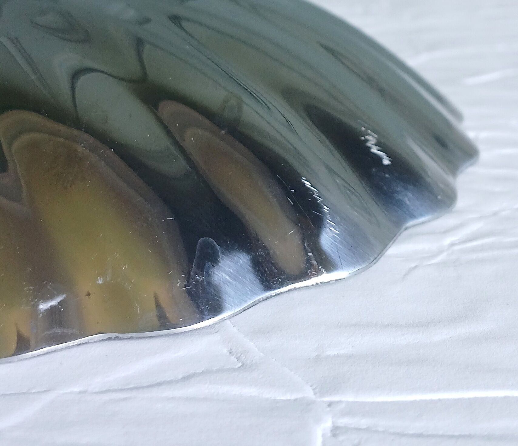 2 shell-shaped bowls in stainless steel