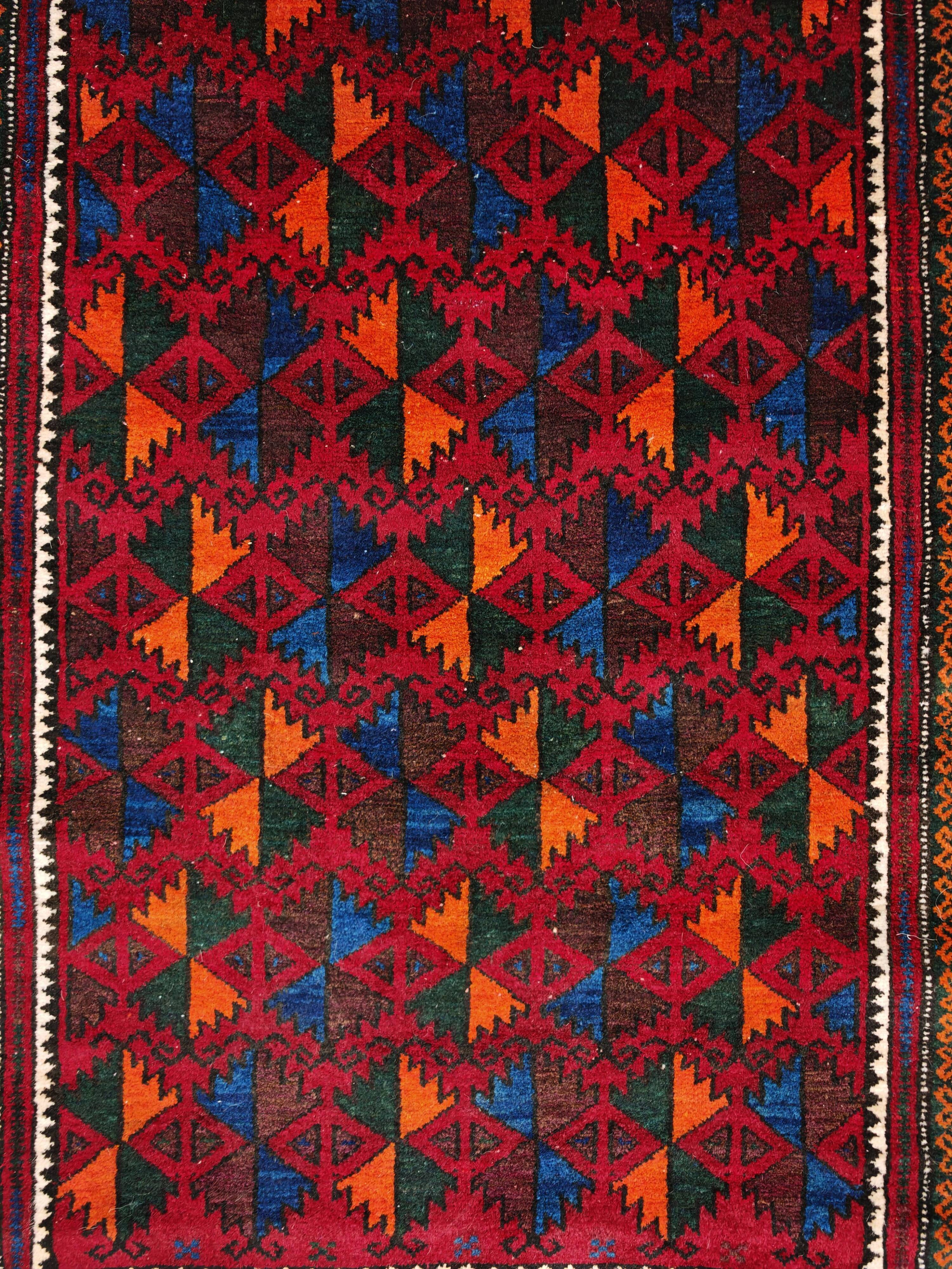 Vintage Baluchi prayer rug, hand-knotted, dyed wool from the 1970s.