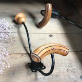 Pair of old wood and metal hooks