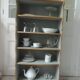 Small vintage bookcase, 5 fixed shelves, interior sublimated in verdigris, waxed finish.