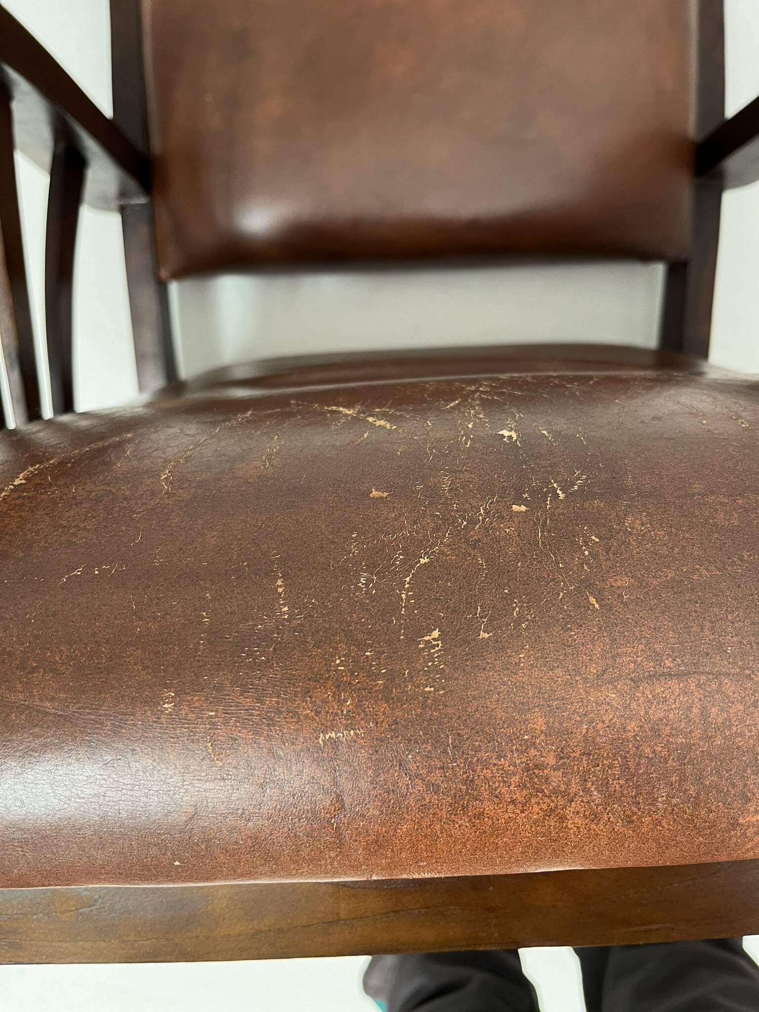 Colonial armchair in teak and leather