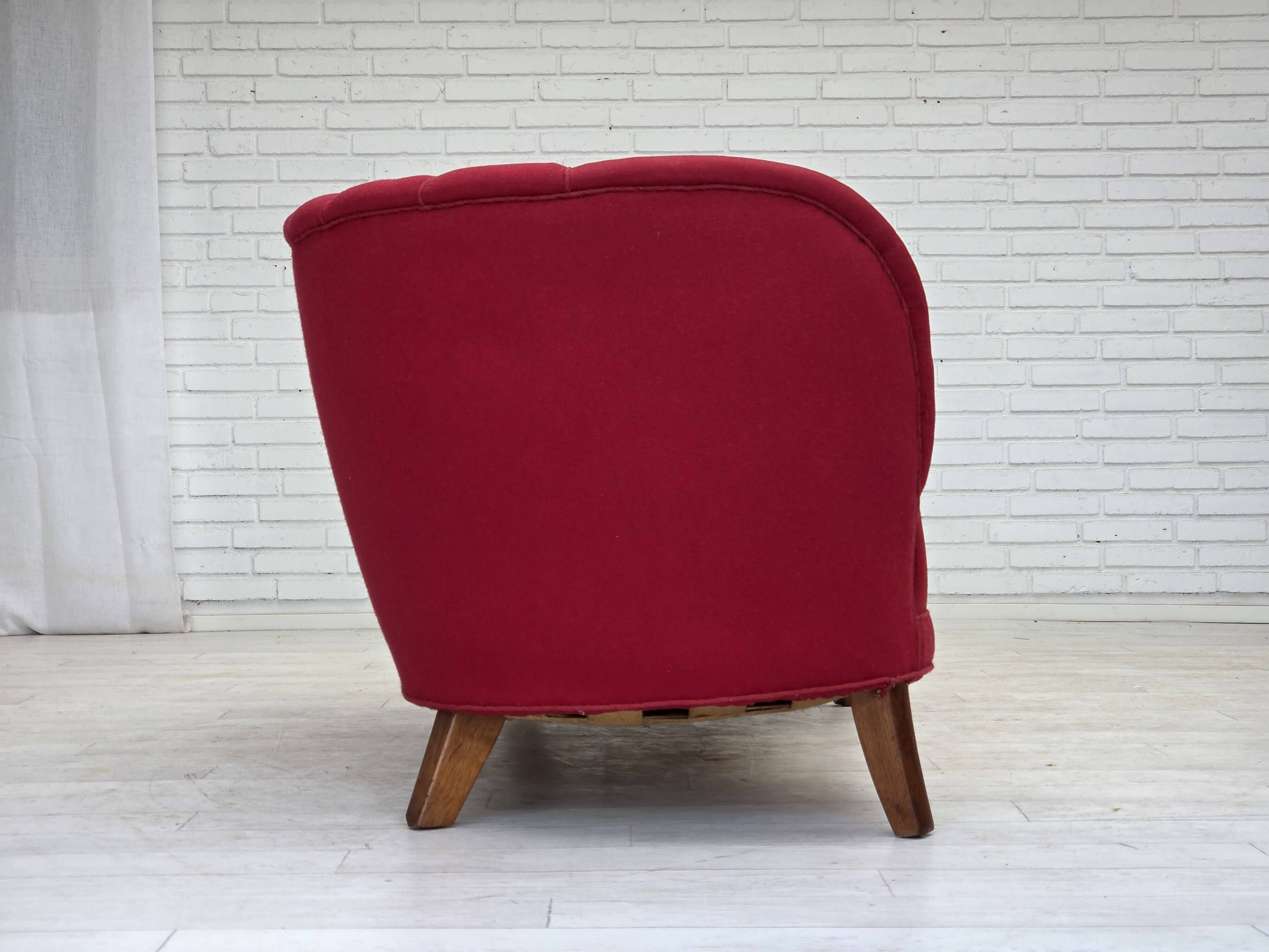 1960s, Danish 2-seater "Banana" sofa, furniture wool, oak wood legs.