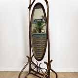 Curved wooden psyche mirror from the 60s