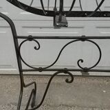 Former cradle in wrought iron