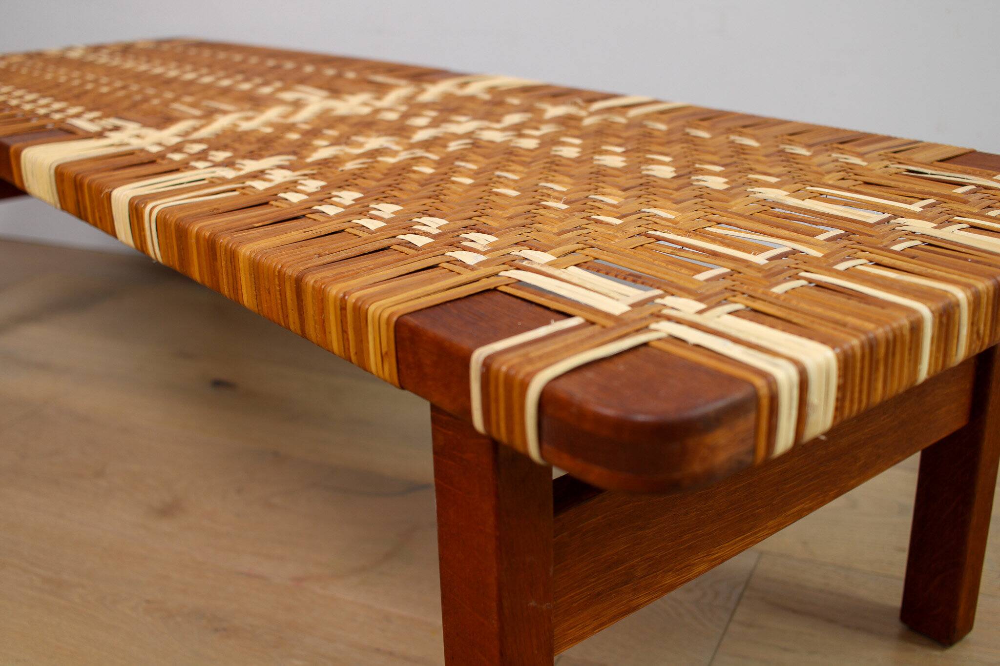 A vintage mid-century Danish Borge Mogensen 5272 rattan coffee table/bench