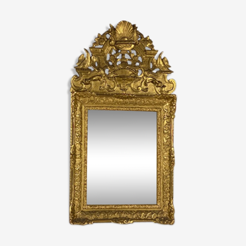 Miroir régence en bois sculpté doré début XVIIIème siècle
