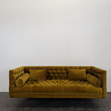 Canapé en velours couleur safran