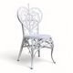 Chaise cœur Peacock rotin blanc 1970
