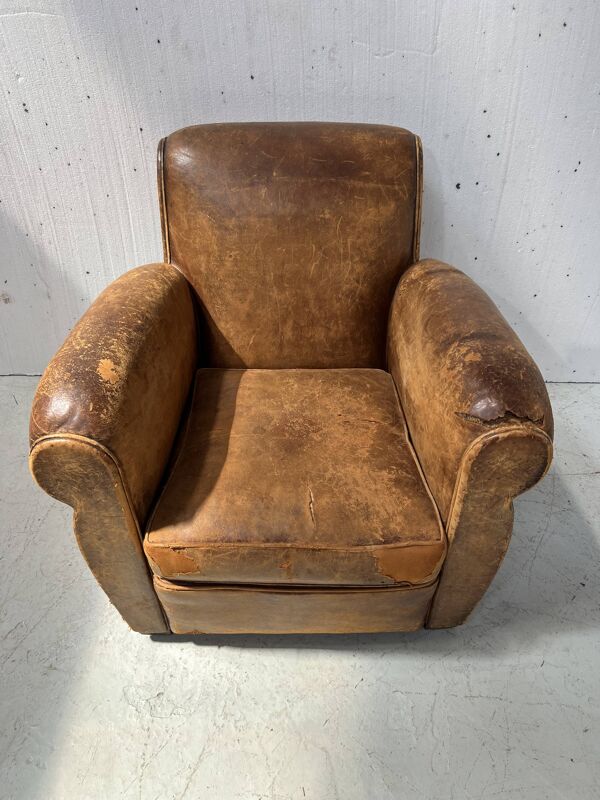 Ancien fauteuil club en cuir fauve XX siècle