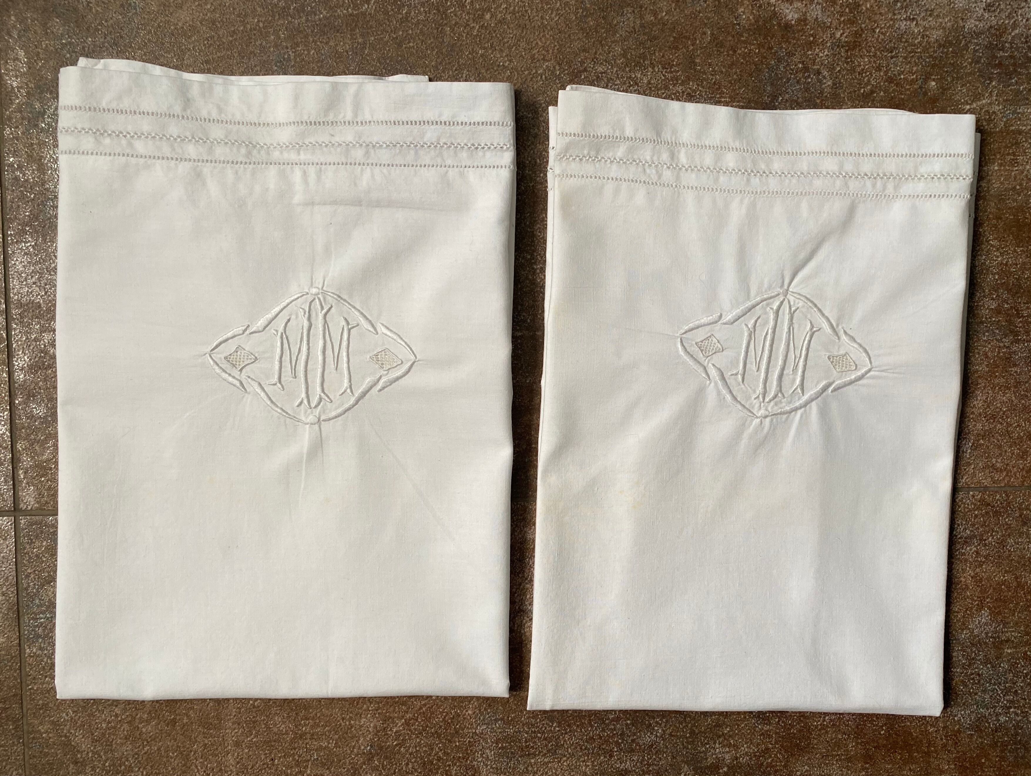 Pair of antique MM embroidered pillowcases
