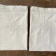 Pair of antique MM embroidered pillowcases