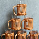 Six vintage 50s glasses in braided rattan cases