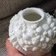 Small white shell vase
