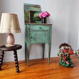 Patinated bedside table end of sofa