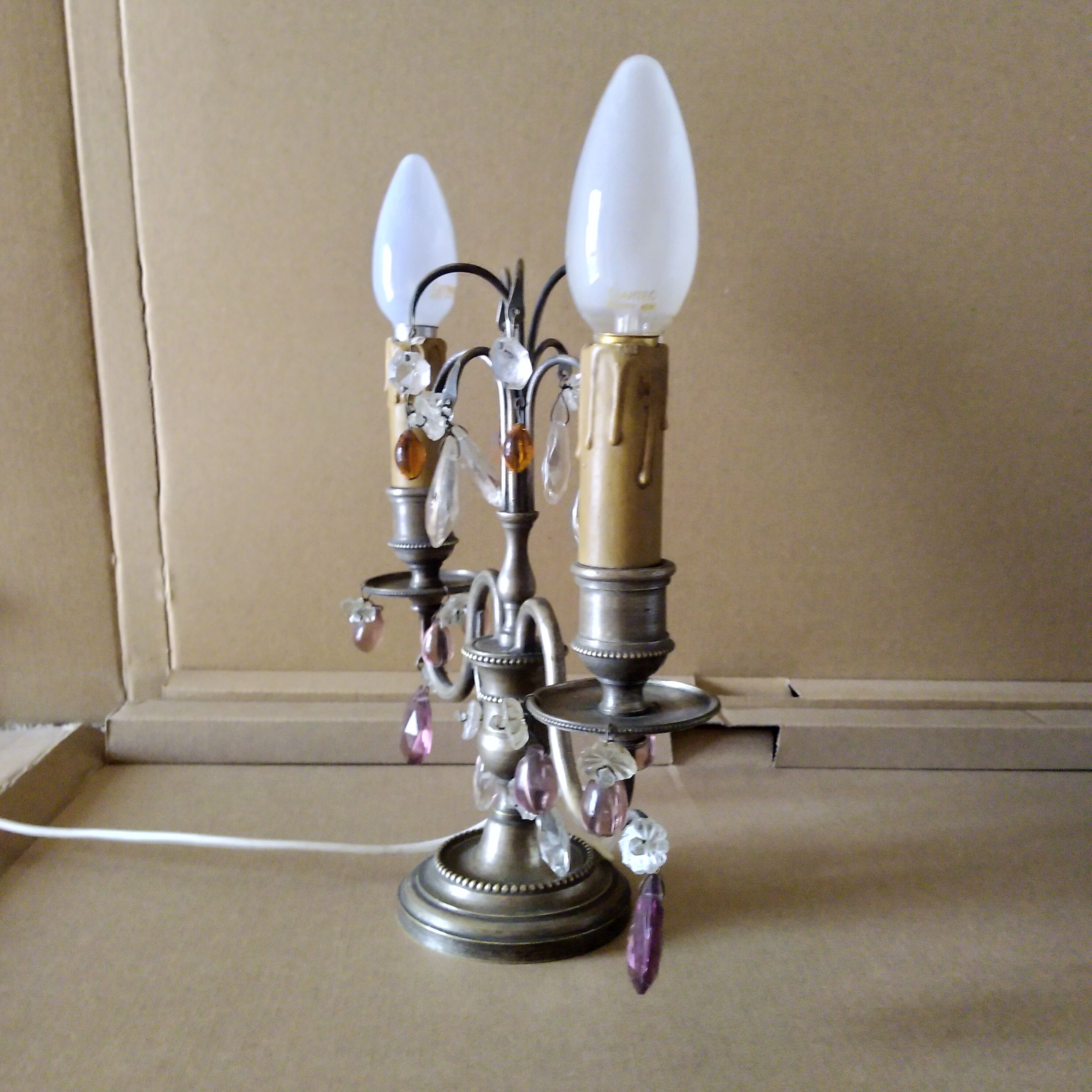 Pair of girandole lamps and silver metal