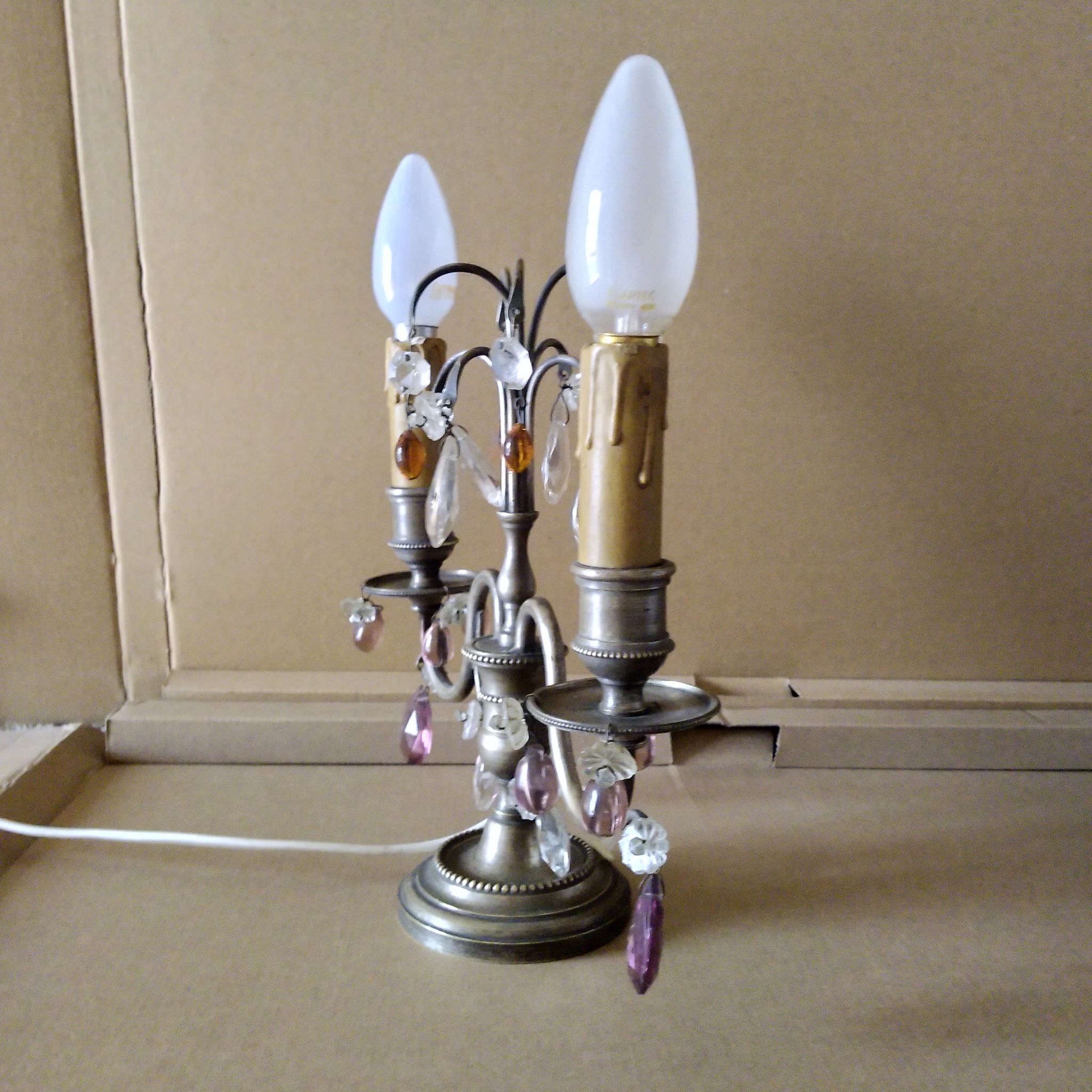 Pair of girandole lamps and silver metal