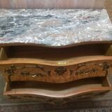 Curved chest of drawers in elm magnifying glass and bronze