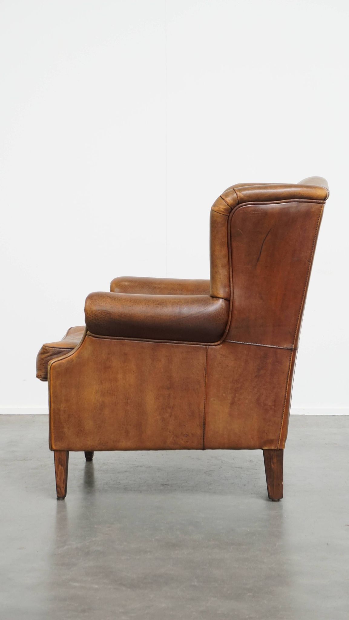 Fauteuil à oreilles vintage en cuir de mouton