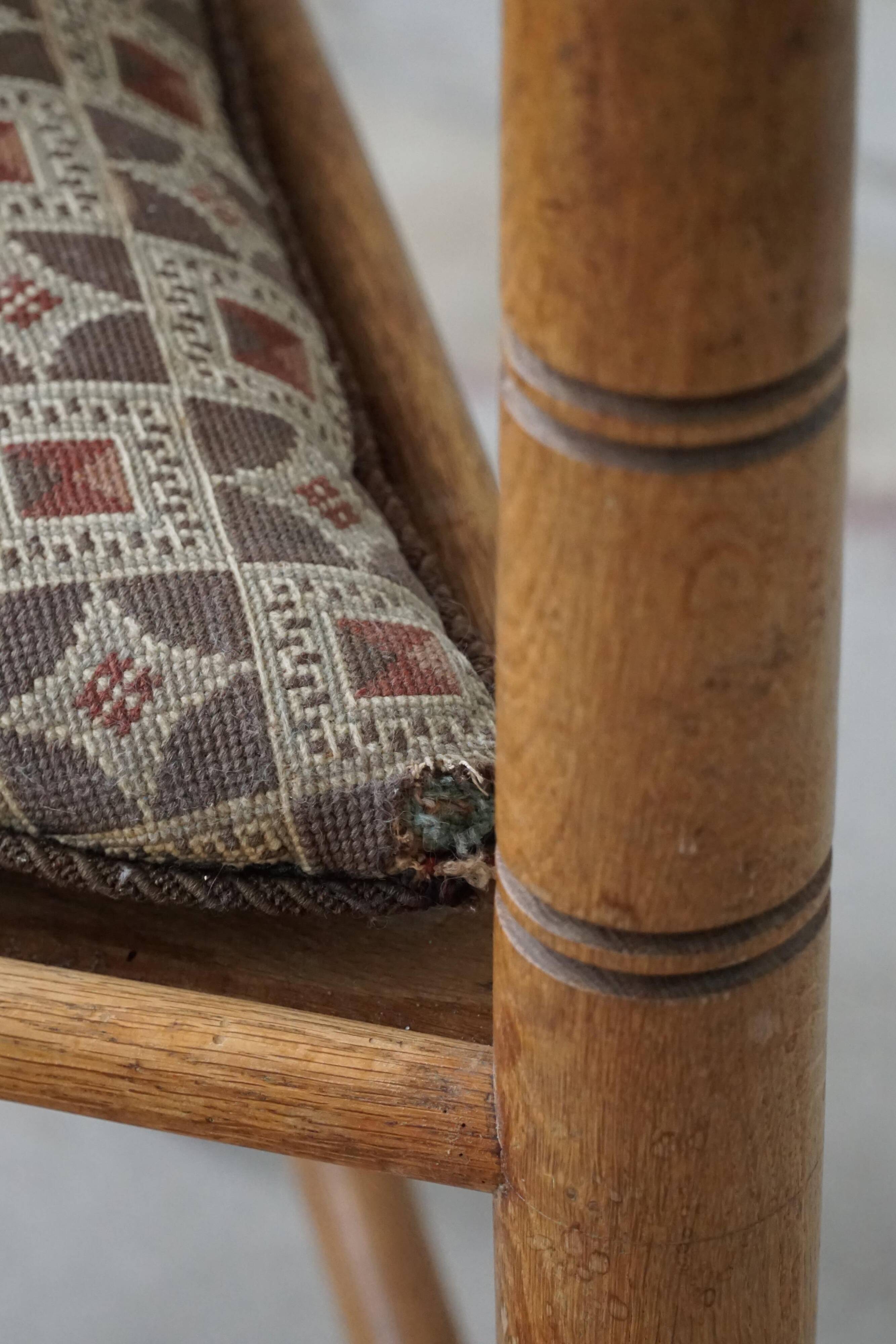 Carved monk's chair in solid oak, Wabi Sabi, Swedish, early 20th century.