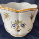 Earthenware cache-pot from Moustiers with bird and floral decoration, interior decor.