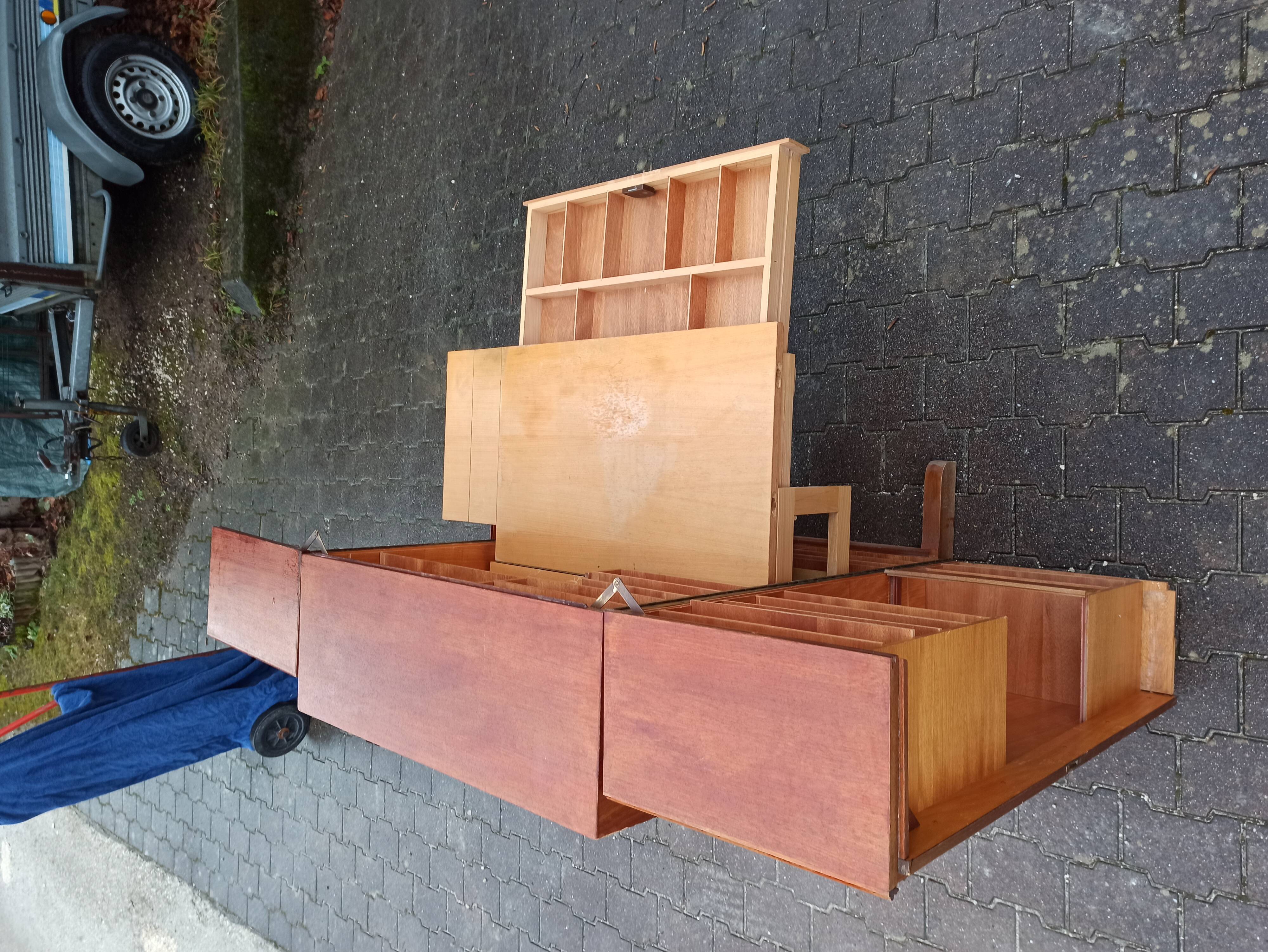 Folding desk says "Magic box" by designers Mummenthaler - Meier, Switzerland