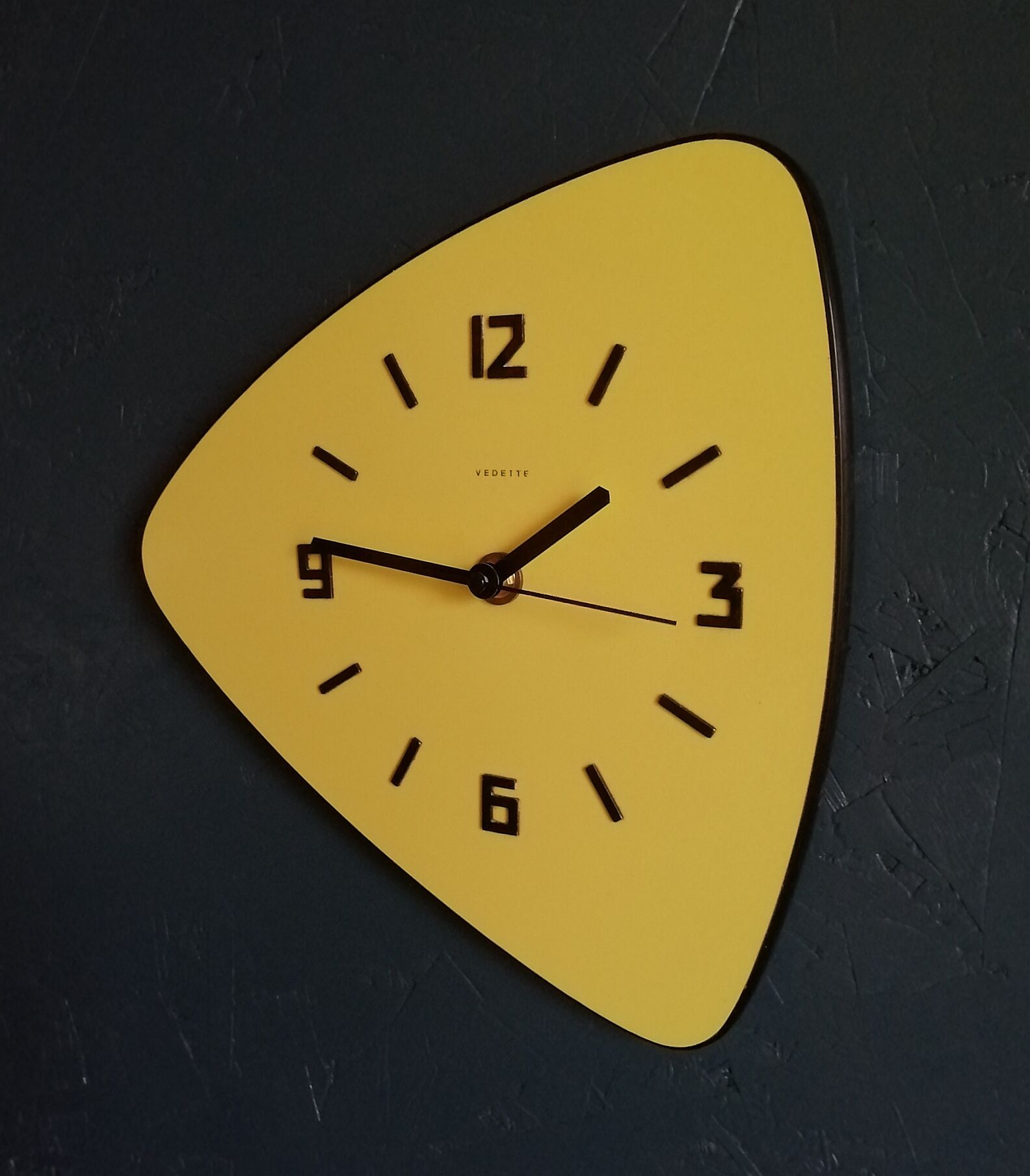 Formica vintage asymmetrical silent wall clock "Yellow Star"