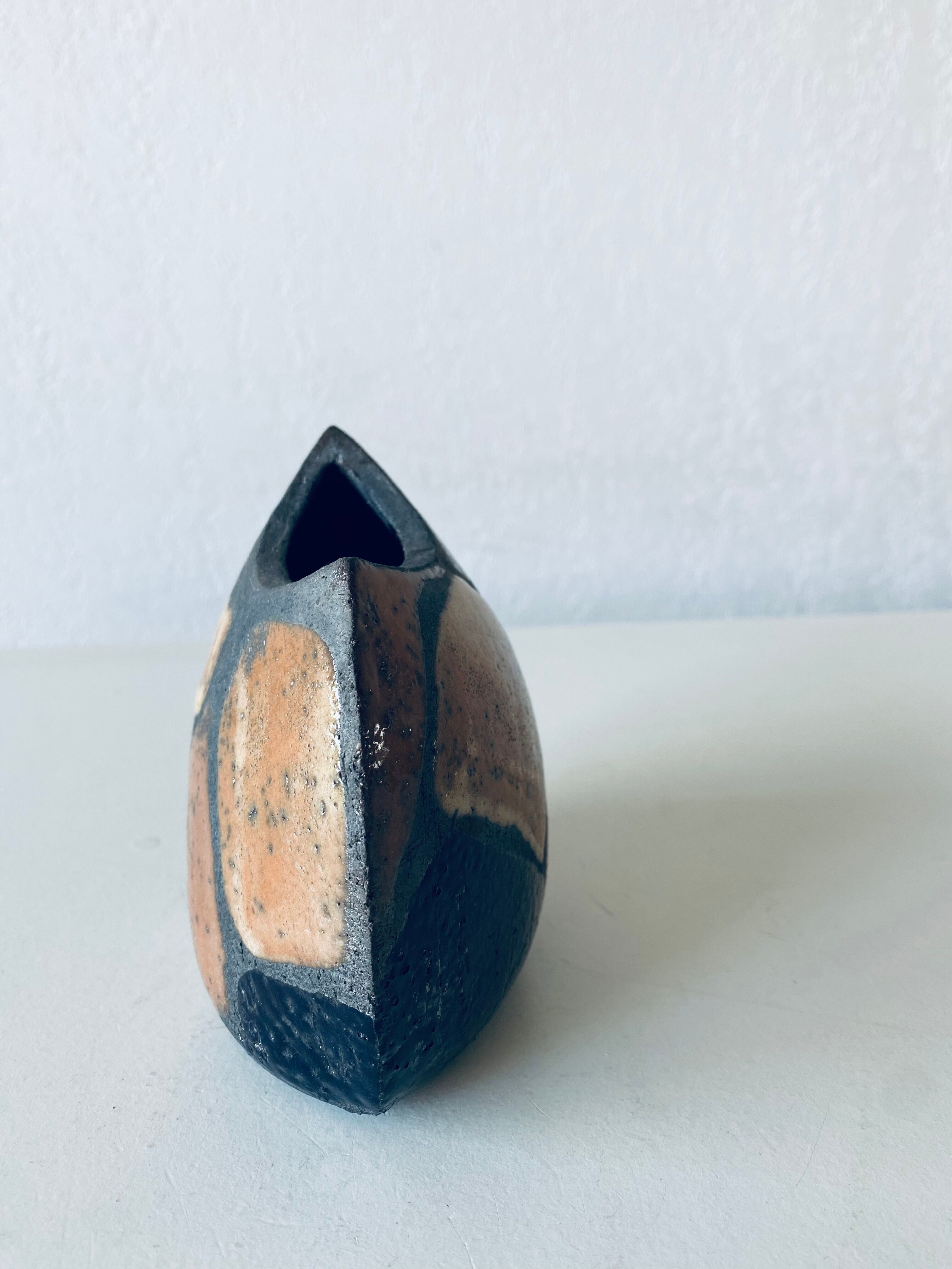 Enamelled ceramic lens vase