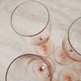 6 champagne flutes with pink stems