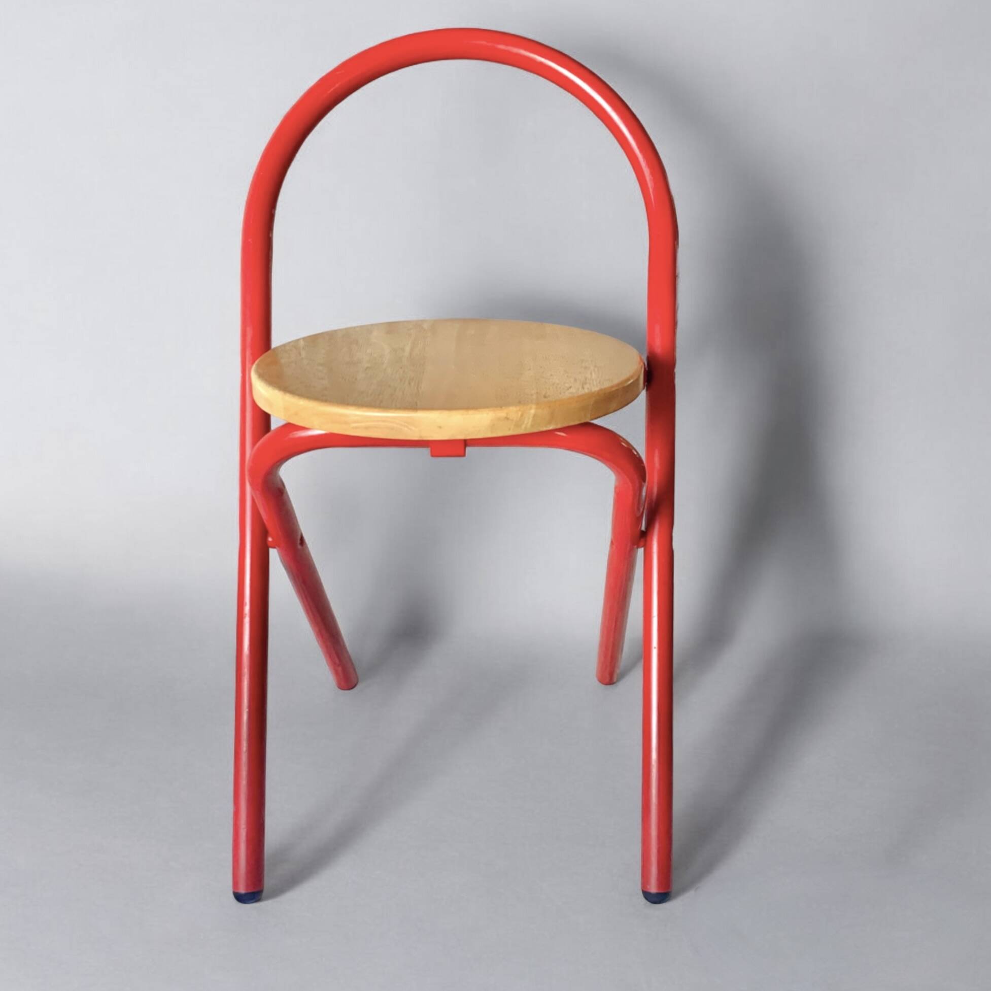 Vintage folding chair in red painted metal and wood