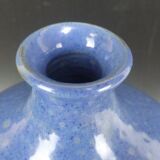 Signed enamelled terracotta bottle vase