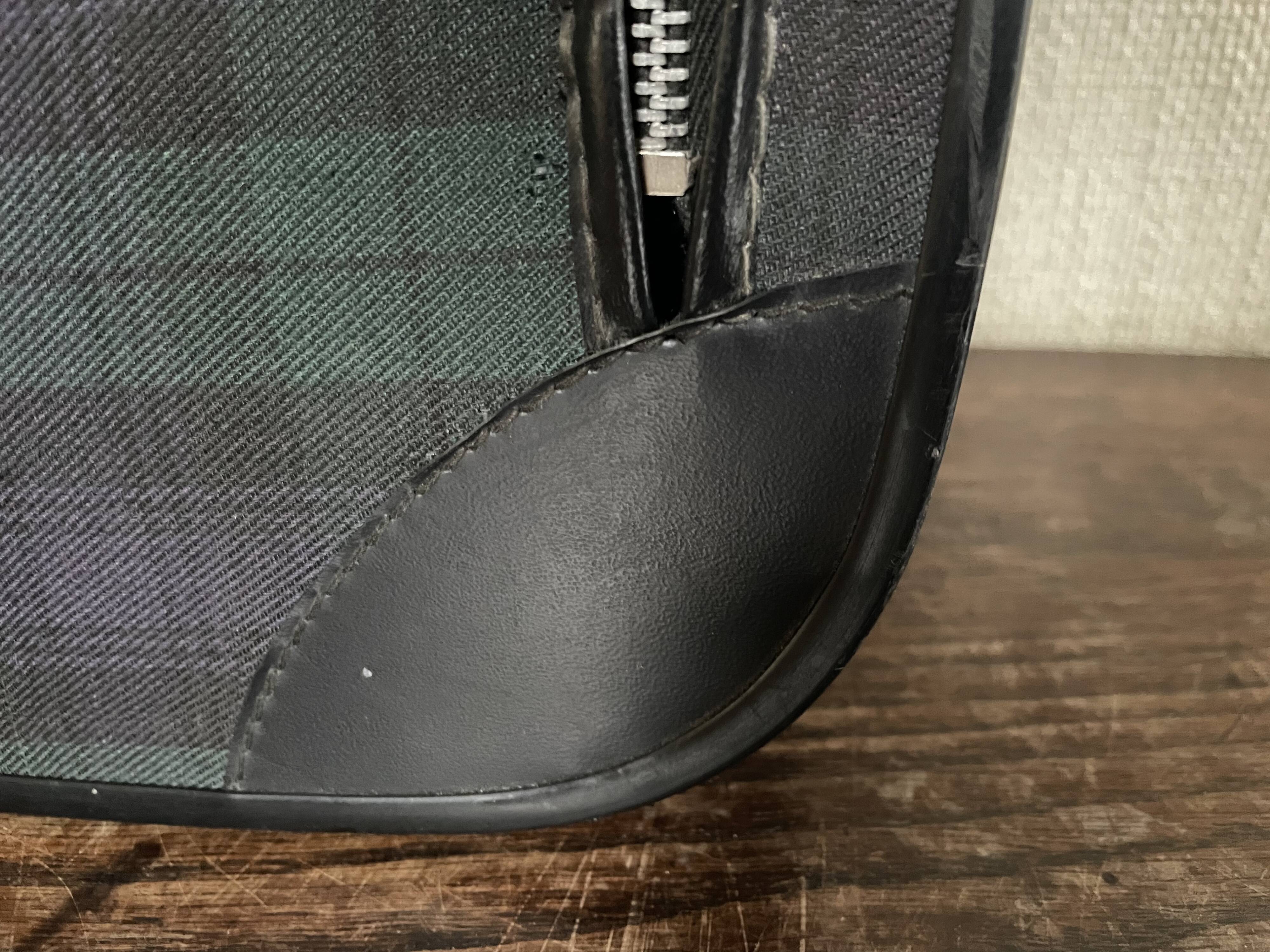 Tartan check suitcase