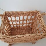 Vintage wicker basket on wheels - children's toy trolley