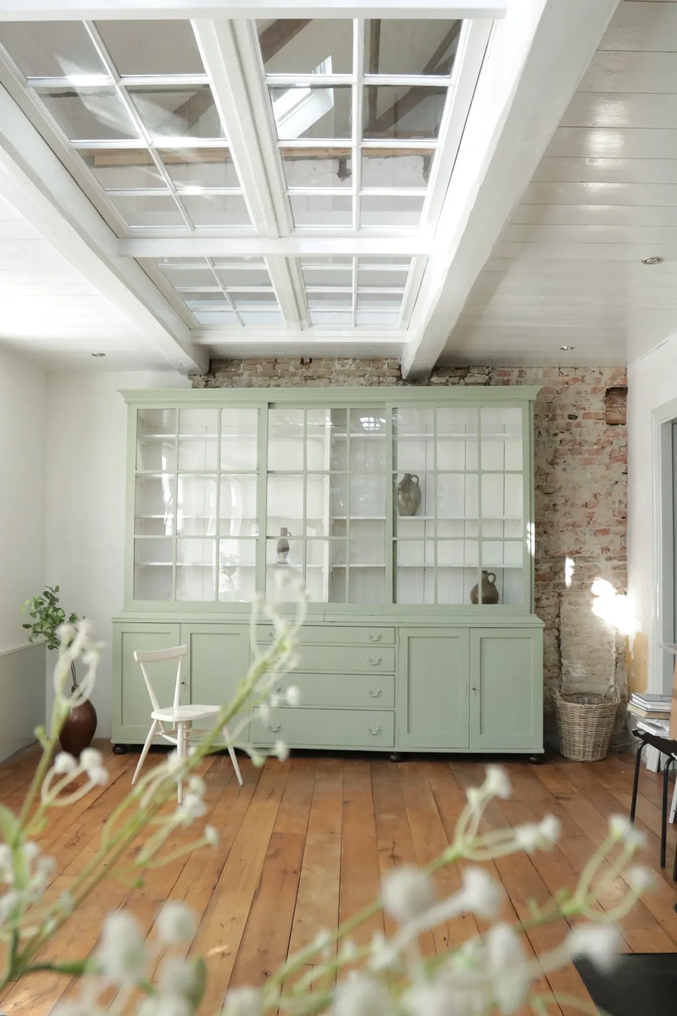 Large green display cabinet with sliding doors – two-part buffet, 219 cm
