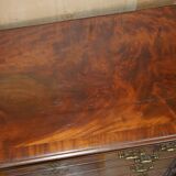 George III commode circa 1770 in walnut by Thomas Chippendale.