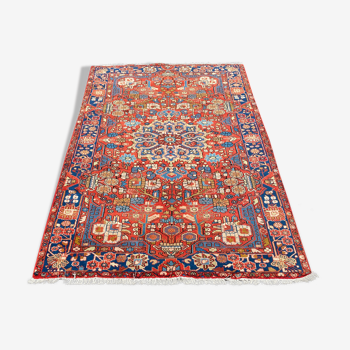 Ancient carpet with bright geometric decorations - 160x245cm